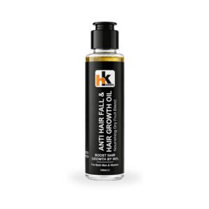 A bottle of HK Khalid Hair Growth Oil with Anti Hair Fall Dry Fruit Blend packaging on a white background.